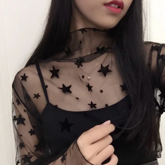 sheer black top with stars